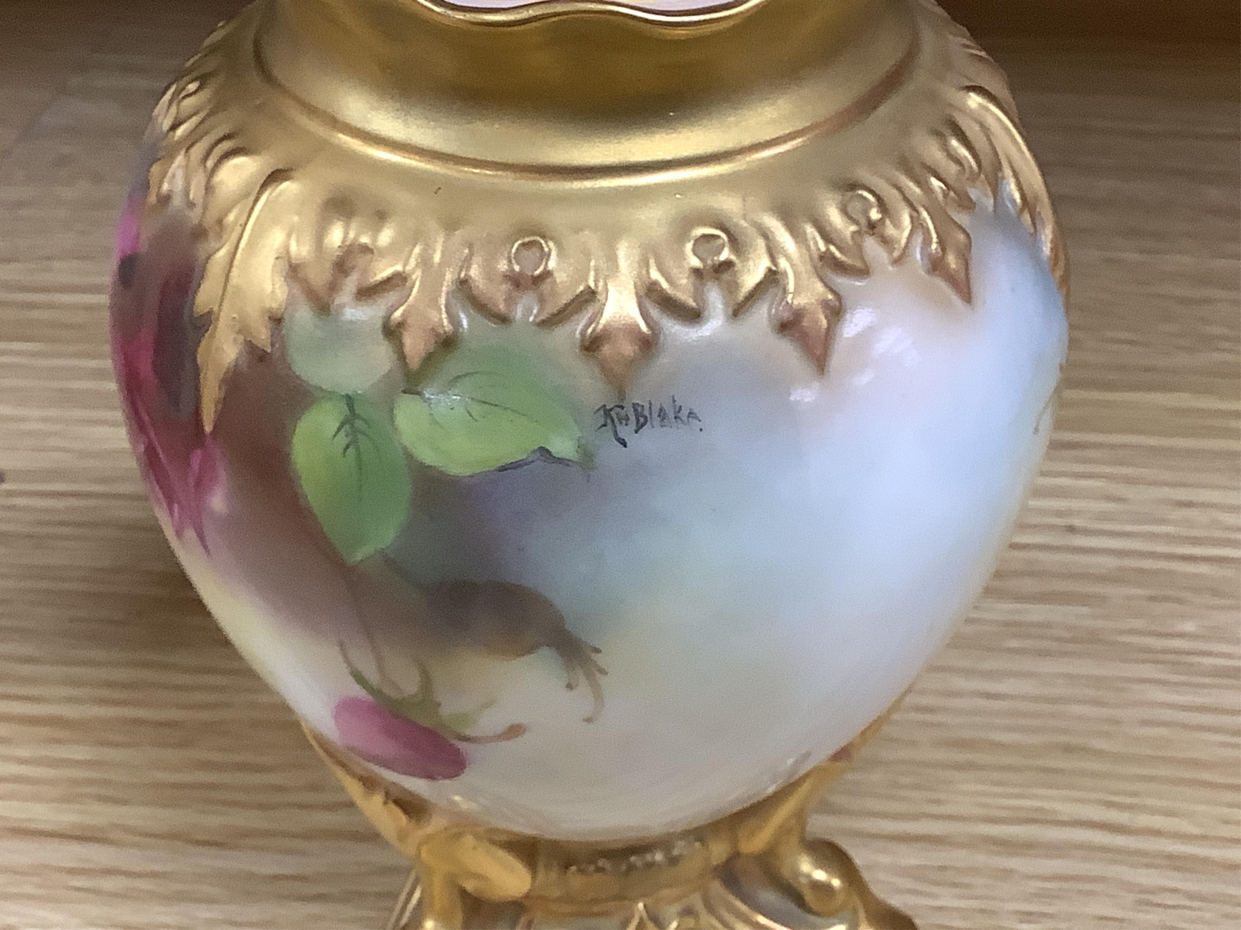 A Royal Worcester vase and cover, shape 1618 decorated with ferns and insects, a similar blush ivory bottle vase and a pot pourri vase and cover decorated with roses, tallest 24cm
